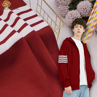 Un bon prix. Tissu tricoté à rayures confortable et absorbant l'humidité pour les vêtements de sport en ligne